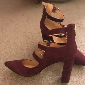 Suede pumps with straps and zip at heel